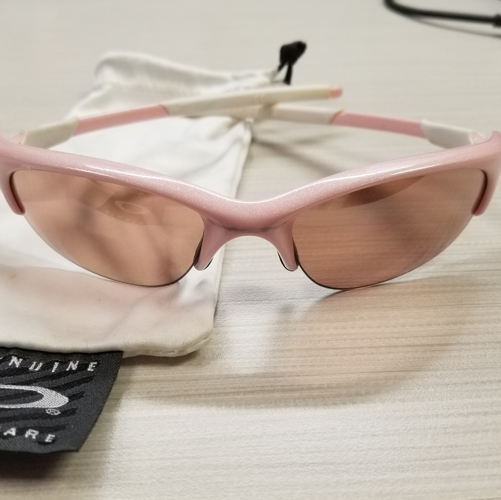 Oakley pink sunglasses.